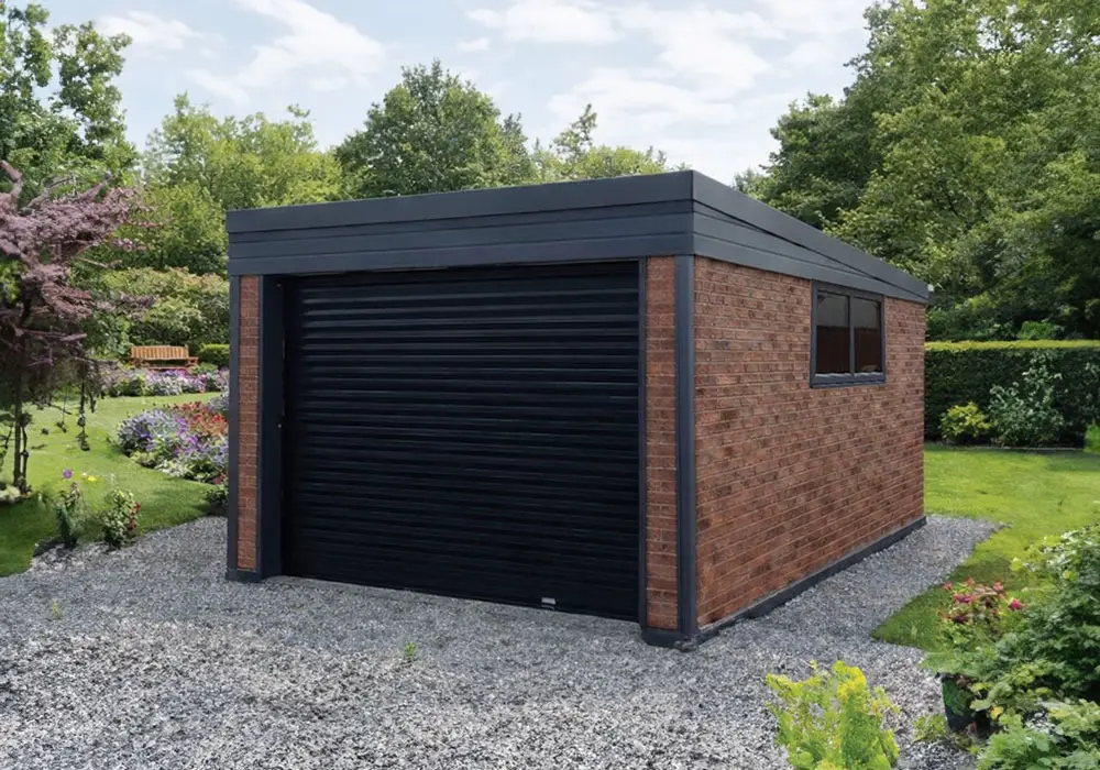 insulated-garages - All Seasons Steel Buildings Brick garden shed with a black roller garage door in a landscaped backyard
