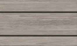Close-up of horizontal wooden planks with visible grain and dark gaps between boards.