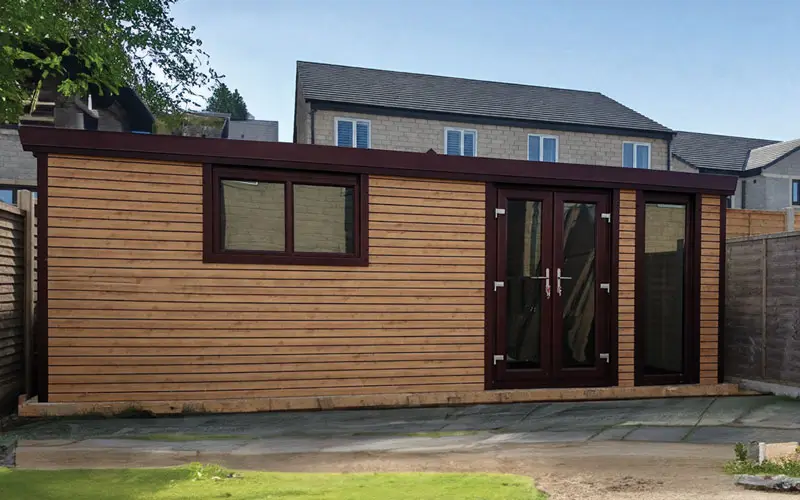 WOOD-CLAD-GARDENROOM - All Seasons Steel Buildings Wooden garden shed in a suburban backyard with a dark-framed double door and a window on the side panel.